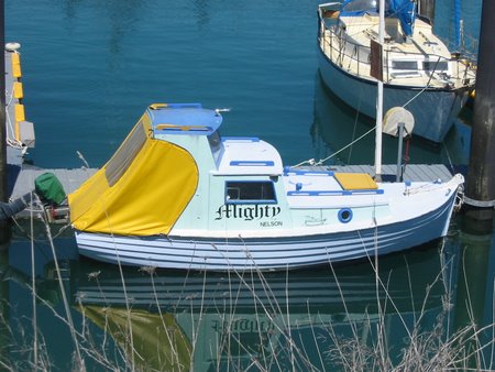 The Mighty, moored near Cousteauâ€™s Calypso